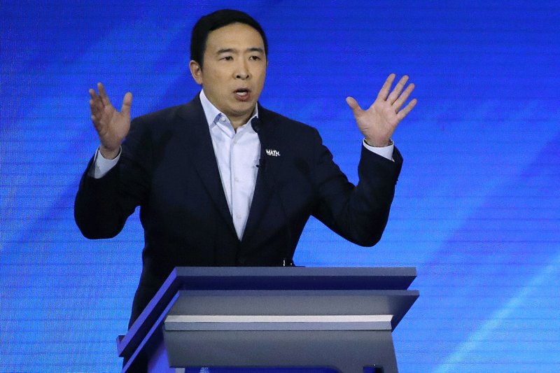 In this February 2020 photo, Democratic presidential candidate entrepreneur Andrew Yang speaks during a Democratic presidential primary debate at Saint Anselm College in Manchester, N.H.
