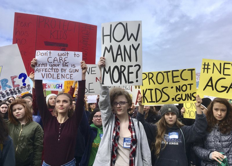 Students at Roosevelt High School take part in a protest against gun violence in March 2018, in Seattle. It was part of a nationwide school walkout that calls for stricter gun laws following the massacre of 17 people at a Florida high school.