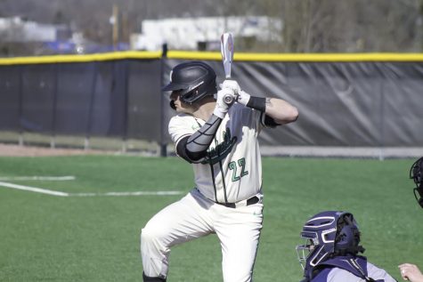 Junior Peter Hutzal readies to swing during a game in the shortened 2020 baseball season.