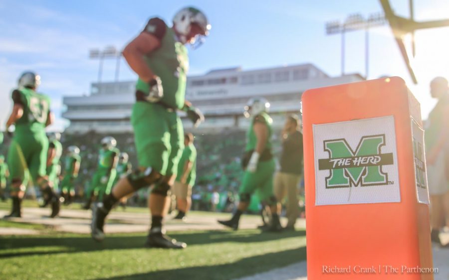 The Marshall football team prepares for its home game against the Ohio Bobcats last season.