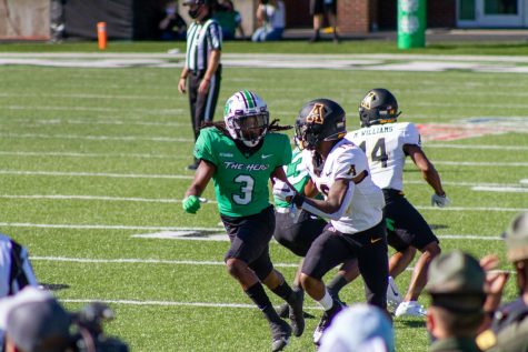 Steven Gilmore makes a tackle against an Appalachian State player during the game.