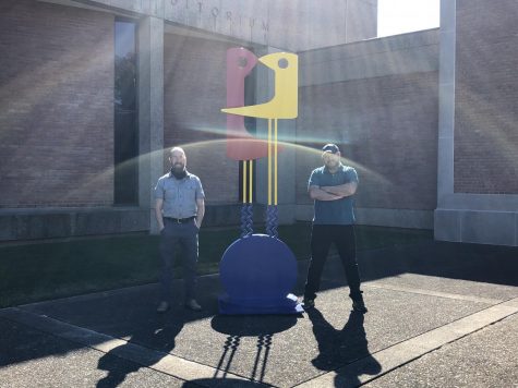 Artist Jamie Sloan and partner, Jimmy Hobbs with “The Kiss” displayed outside of The Huntington Museum of Art.