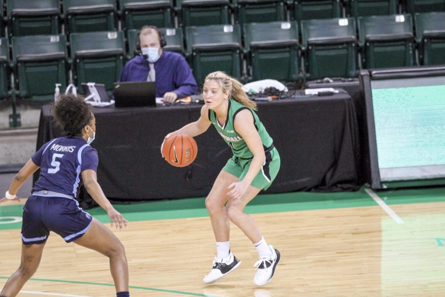 Sophomore guard Savannah Wheeler dribbles beyond the three-point line against Old Dominion on Feb. 5 2021. 
