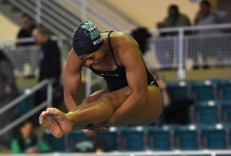 Joelle Williams during a diving competition. | Photo Courtesy of MU Athletics