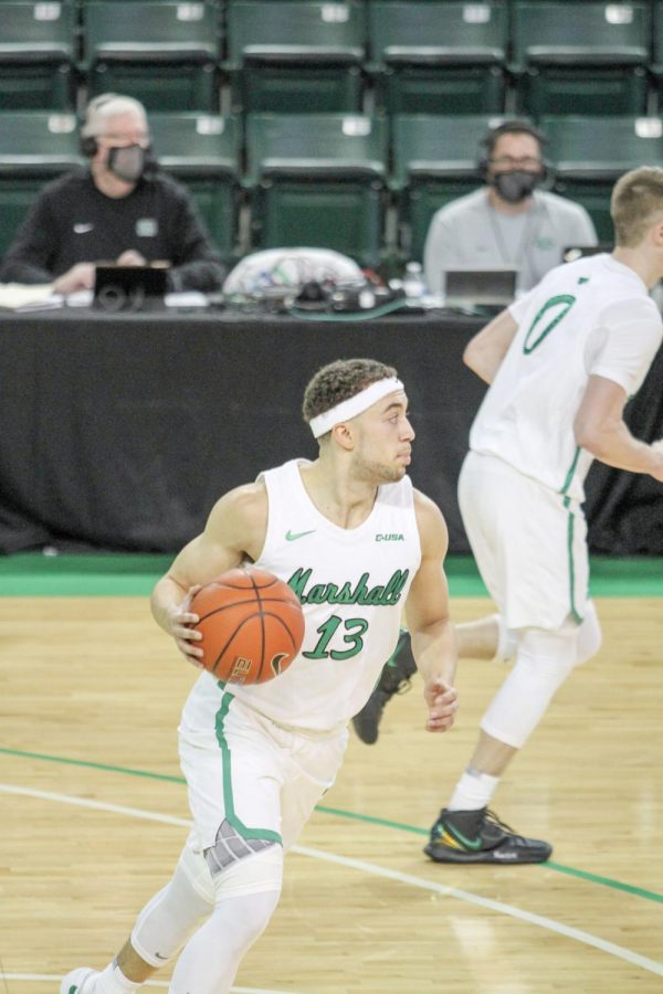 Jarrod West brings the ball up the court against North Texas Friday, Feb. 26 in one of his final appearances in the Cam Henderson Center. West injured his ankle in the contest, missing the following day’s game - the only missed game of his career. 