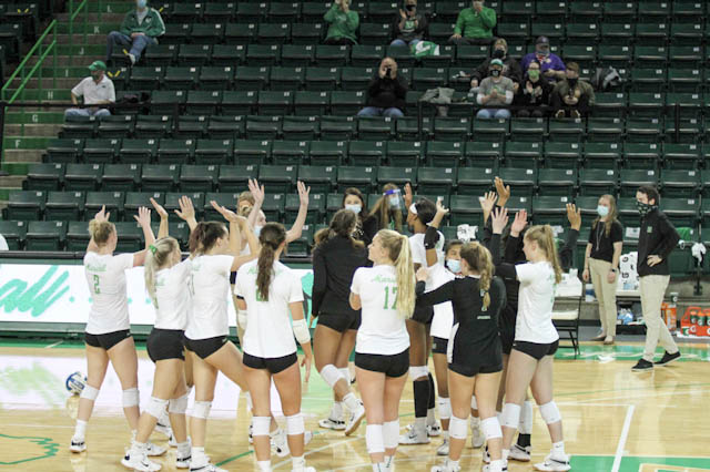 The+Marshall+volleyball+team+gathers+in-+between+sets+against+Western+Kentucky.+The+Thundering+Herd+and+Hilltoppers+matched+up+in+Huntington+for+two+matches+on+Feb.+28+and+March+1.+The+nationally-ranked+Hilltoppers+won+both+matches.+