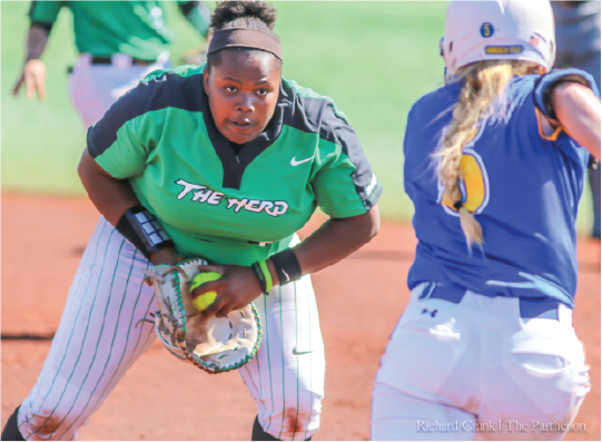 Marshall first baseman Aly Harrell (43) attempts to tag out a Morehead State baserunner during the teams’ matchup at Dot Hicks Field on April 11, 2018.