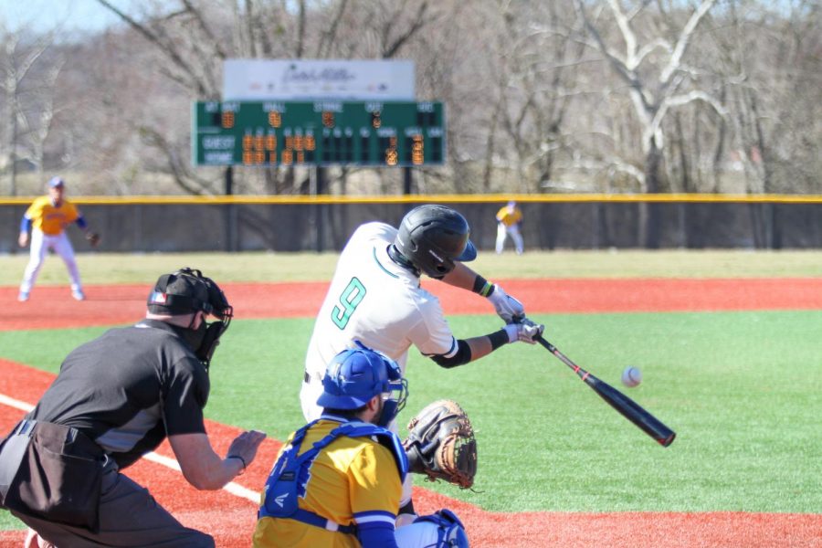 Freshman catcher Ryan Leitch swings at a pitch against Morehead State on Sunday, March 7. Marshall lost the contest 6-2. 