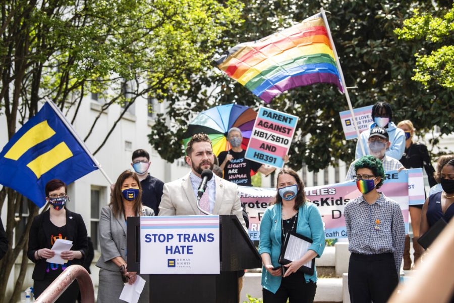 Alabama Rep. Neil Rafferty speaks in support of transgender rights during a rally outside the Alabama State House in Montgomery, Ala., on Tuesday, March 30, 2021. (Jake Crandall/The Montgomery Advertiser via AP)