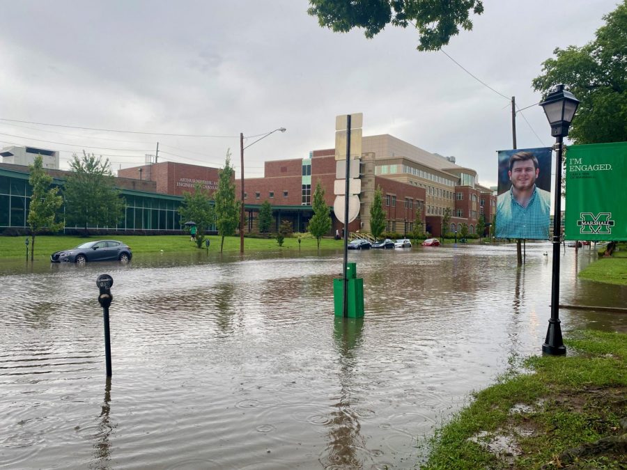 Flash flood makes third avenue impossible to drive during the storm