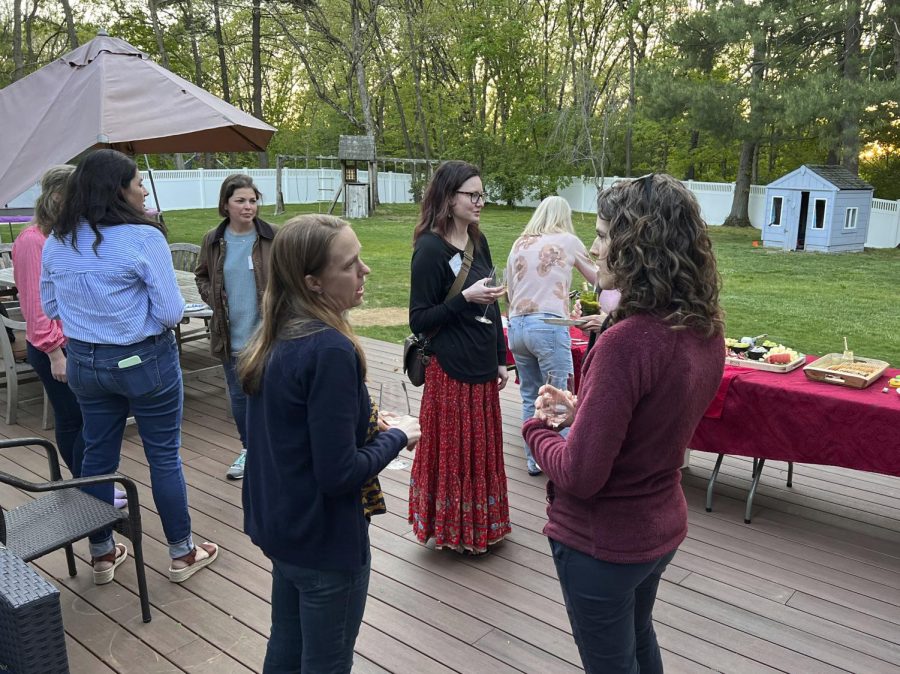 Kindergarten mothers gather for a PTO-sponsored Moms Night Out in Newton, Mass., on May 18, 2022. Parent Teacher Organizations have become a place where adults make friends and develop professional skills, all while having some fun.