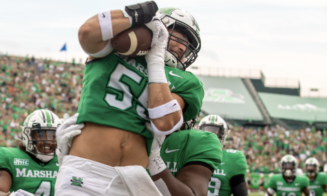 Marshall Drops to Troy on the Road