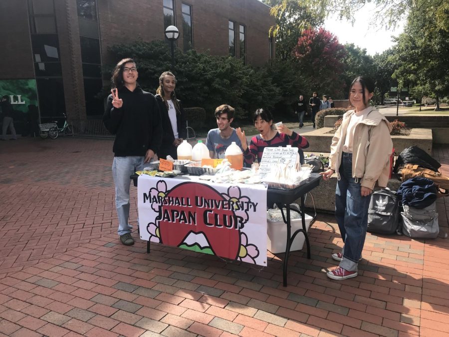 Members of the Japan Club table on the student center plaza. 