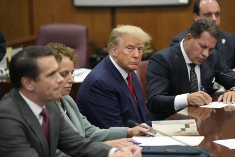 Former President Donald Trump sits at the defense table with his defense team in a Manhattan court on April 4 in New York