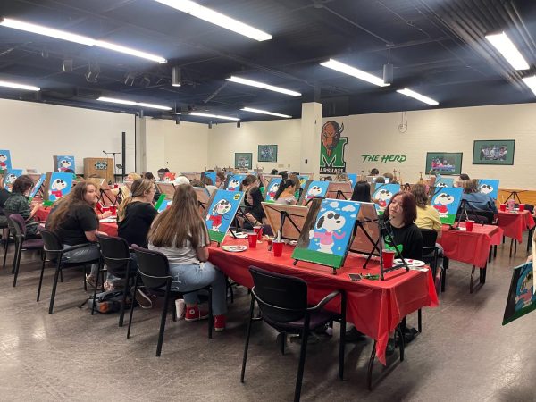 Students painting at the Paint and Sip on Sept. 13.