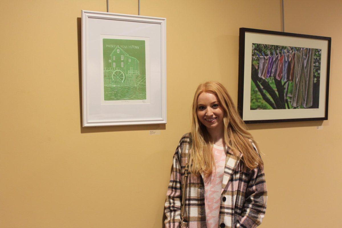 Graci Davis with her work titled “Preserve Your History.”