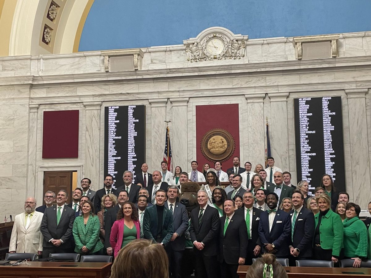 Prominent officials and professors from
Marshall stand inside the Capitol Building.