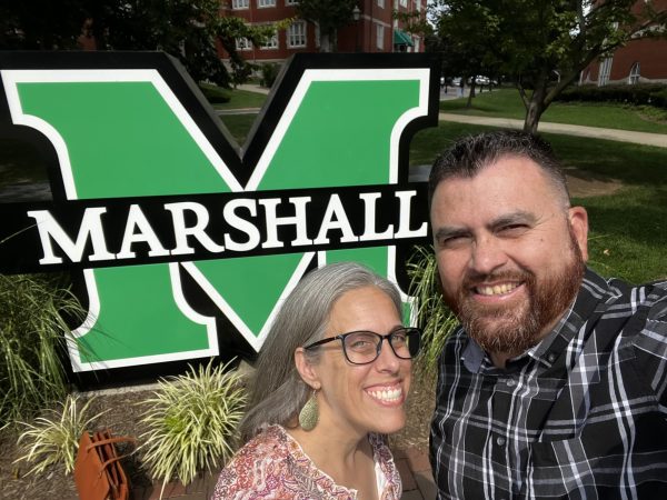 The Vallejos posing on campus at Marshall University.