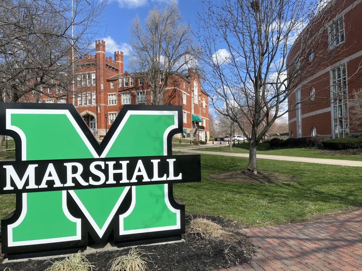 Marshalls logo stands just outside the oldest building on campus, Old Main, which students can encounter during their campus tours at orientation.