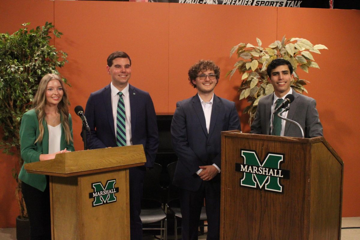 The candidates for student body president and vice president pose for a photo before the debate. L-R: Brea Belville, Conner Waller, Luke Jeffery, Nico Raffinengo.