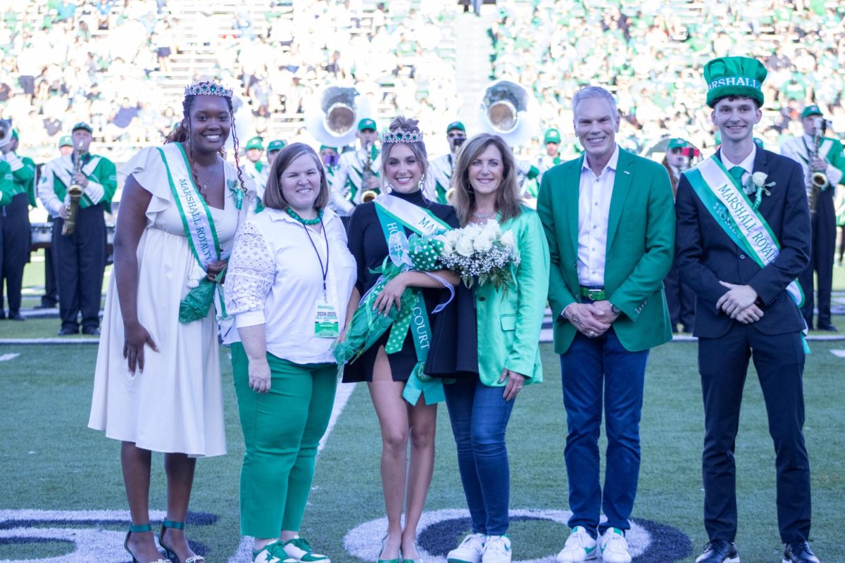 Pictured left-to-right: 2023 Homecoming attendant Semoni Weaver, vice president of
Intercultural and Student Affairs Marcie Simms, 2024 homecoming attendant Kylie Fisher, first
woman Alys Smith, University President Brad D. Smith and 2024 attendant Dylan Ellison.