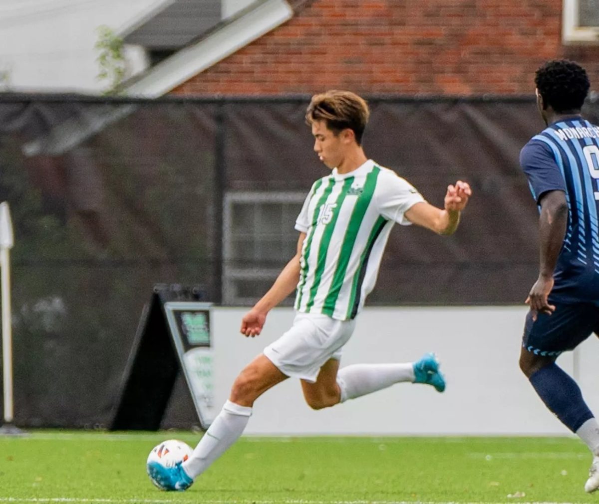 Fujita launches the ball during a previous match.