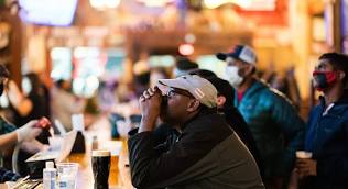 Individuals anticipating election results  