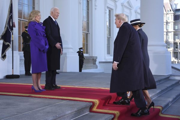 The President Joe Biden, center left, and first lady Jill Biden, left, greet President-elect Donald Trump, center right, and Melania Trump, right, upon arriving at the White House, Monday, Jan. 20, 2025, in Washington.