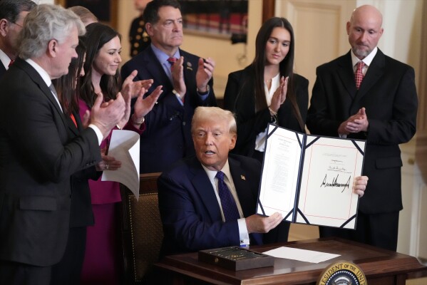 President Donald Trump signing The Laken Riley Act. Photo by AP News