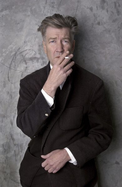 Filmmaker David Lynch poses at his Los Angeles home March 14, 2002. 