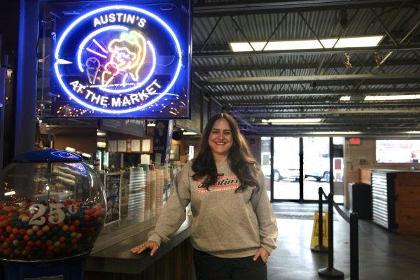 Co-Owner Taylor Strickland Chambers photographed in front of Austin's at the Market. 