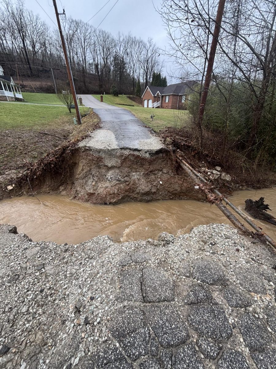 Thompson said this damaged road was the only available route out of her neighborhood in Salt Rock, West Virginia  
