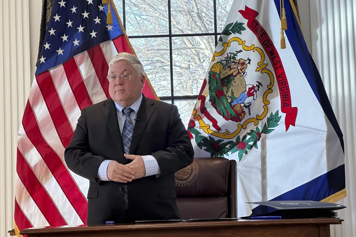 West Virginia Gov. Patrick Morrisey speaks about executive orders he issued on his first day as governor at a news conference at the State Capitol in Charleston, W.Va. on Tuesday, Jan. 14, 2024. (AP Photo/Leah Willingham)
