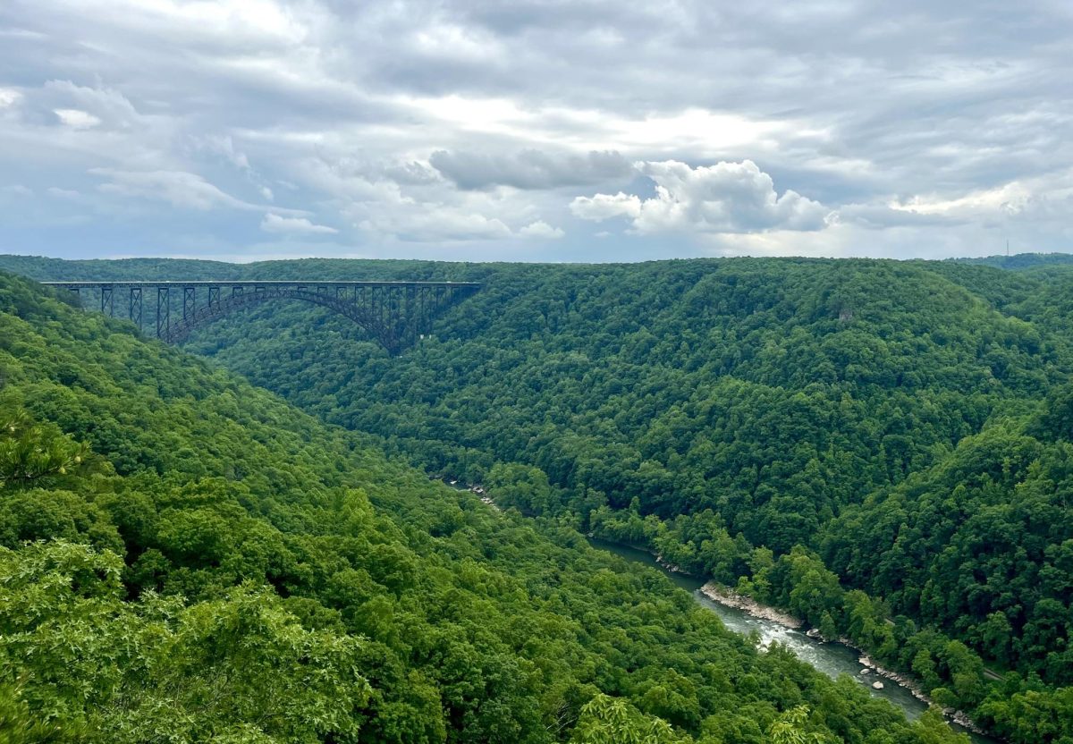 The New River Gorge Bridge is a steel arch bridge spanning 3,030 feet long over the New River Gorge.