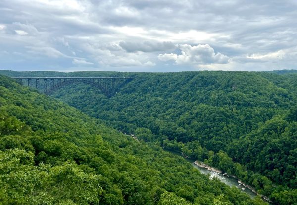 The New River Gorge Bridge is a steel arch bridge spanning 3,030 feet long over the New River Gorge. 