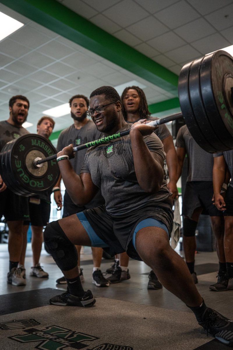 As the 2025 season quickly approaches, the Marshall Football team spends its days in the weight room (pictured: Tariq Montgomery).
