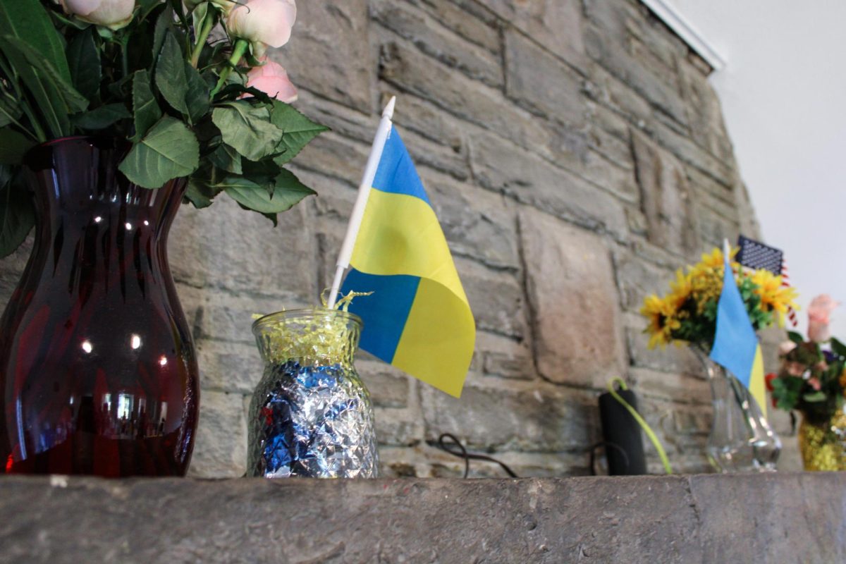 Ukrainian flags are put on display at the Taste of Ukraine event at the St. Cloud Commons Lodge in Huntington on Aug. 22.