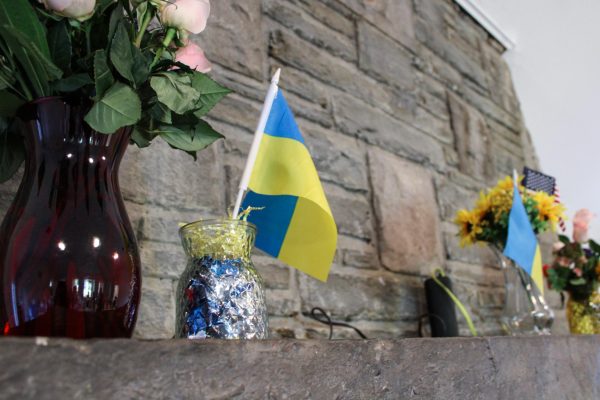 Ukrainian flags are put on display at the Taste of Ukraine event at the St. Cloud Commons Lodge in Huntington on Aug. 22.