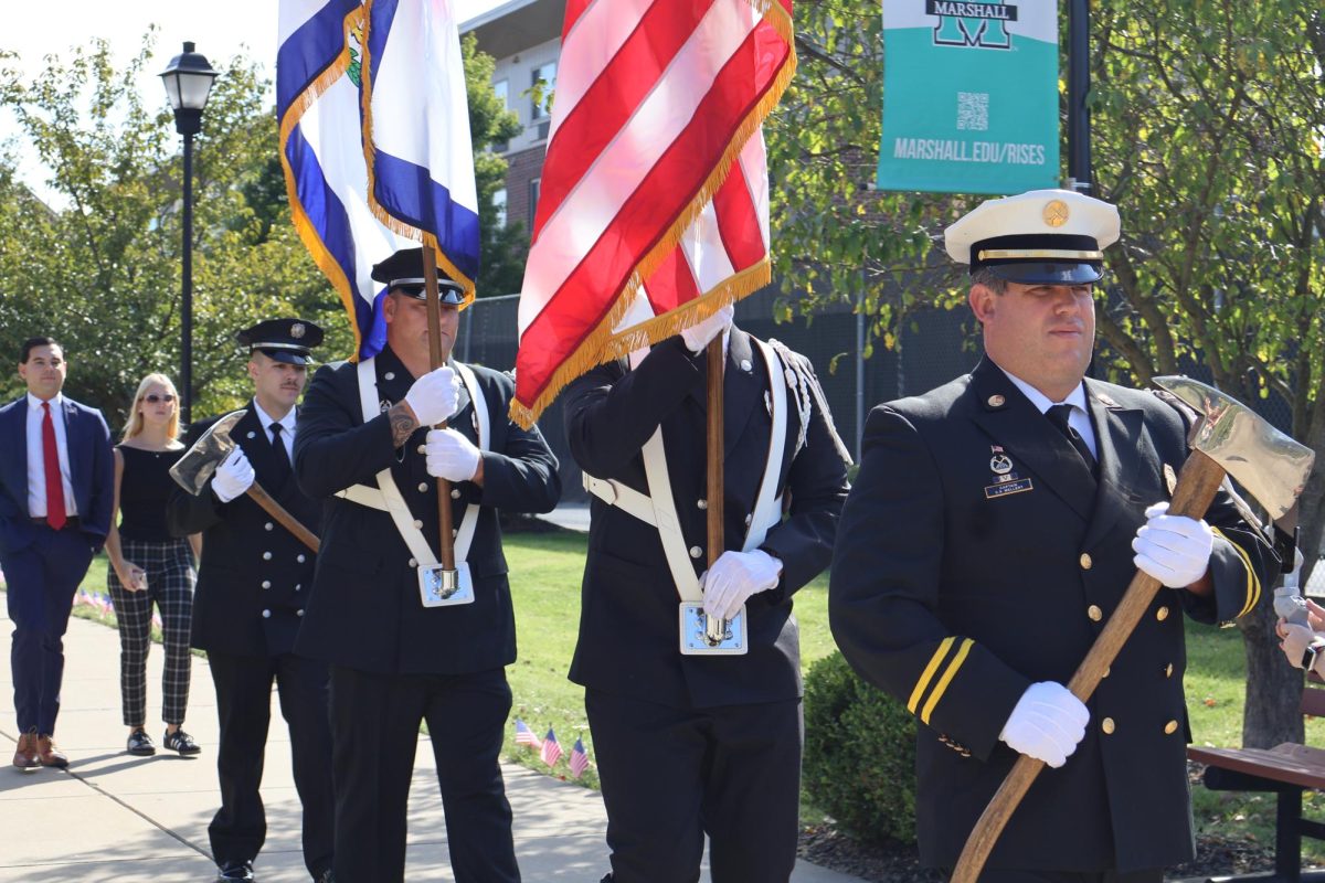 Participants in the first day of the 9/11 Days of Service participated in a tribute walk to remember Marshall University alumnus Paul Ambrose and the others who lost their lives during the terrorist attacks at the World Trade Center and the Pentagon in 2001. 