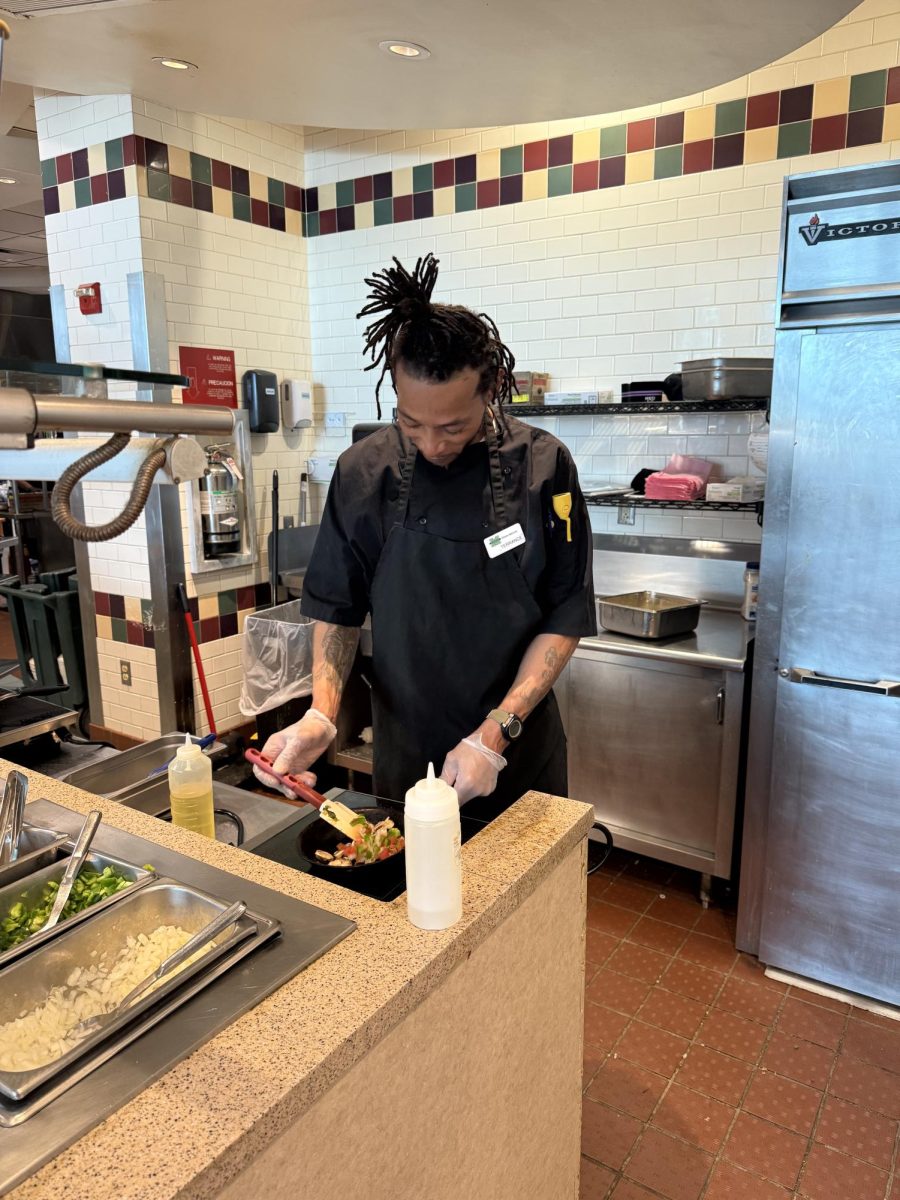 Terrance Ewing cooking for Marshall University Food Service