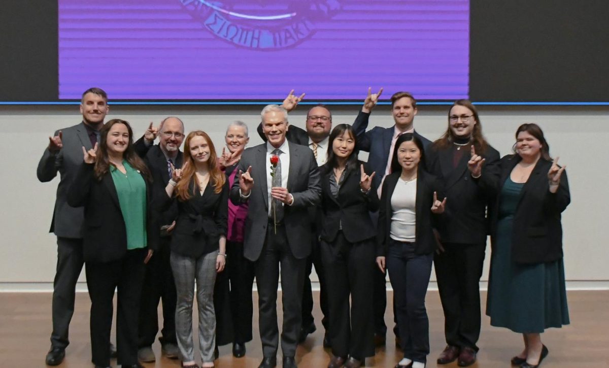 President Brad D. Smith was honored for his business efforts at Delta Sigma Pi’s ceremony March 2. 